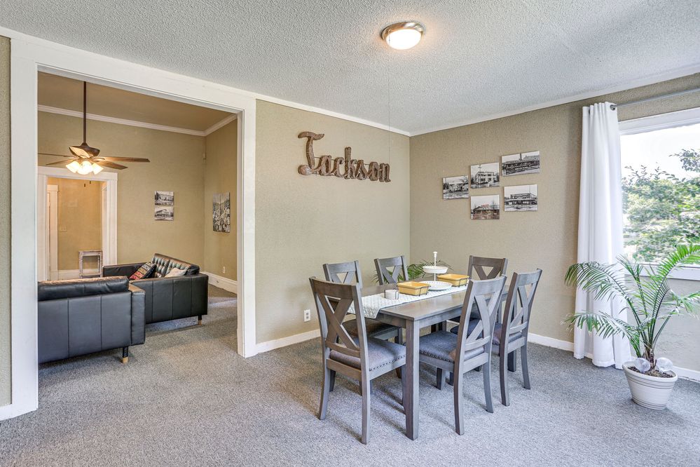 Dining room with photos of local restaurants on the wall