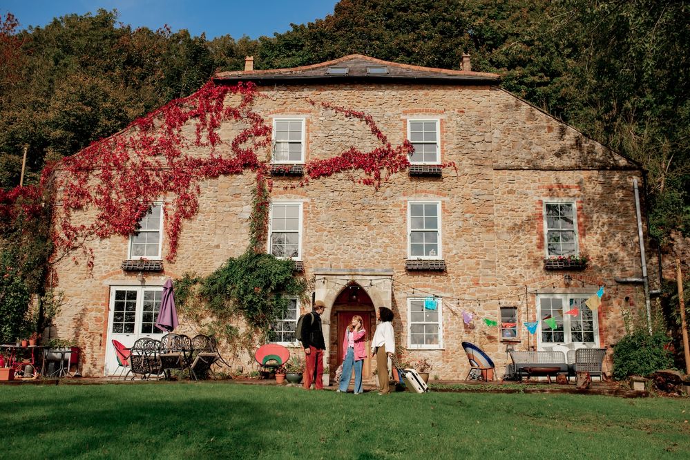 Charming Countryside Stone House with Ivy and Guests Arriving - Airbnb Community Center.jpg