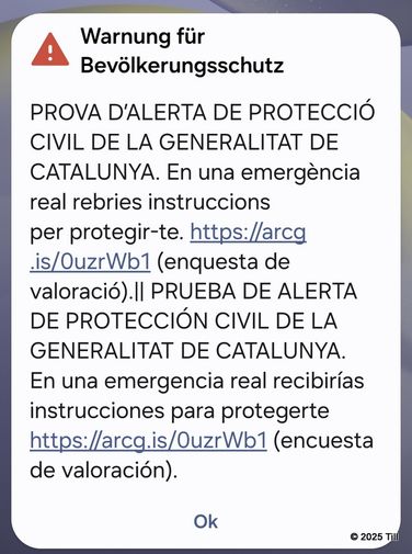 Warnung auf Katalanisch und Spanisch