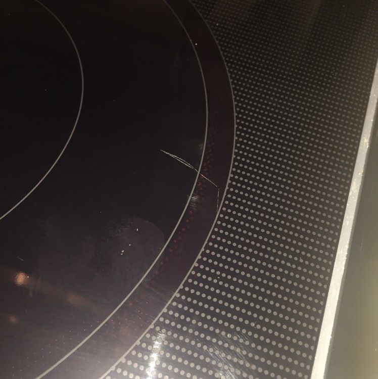 Glass Stove top scratch by guests