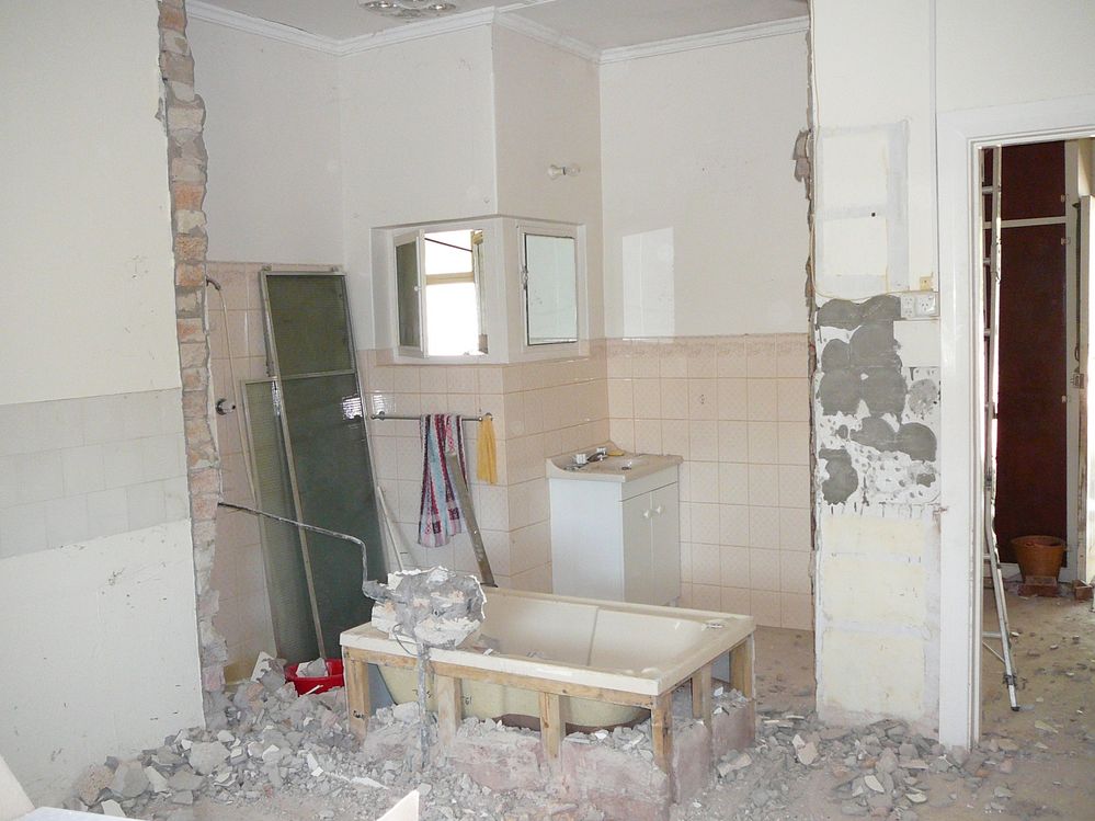 The bathroom was in the way of half the kitchen and the lounge room.