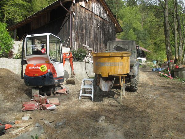 2019-07-16 mixing concrete in the driveway.jpg