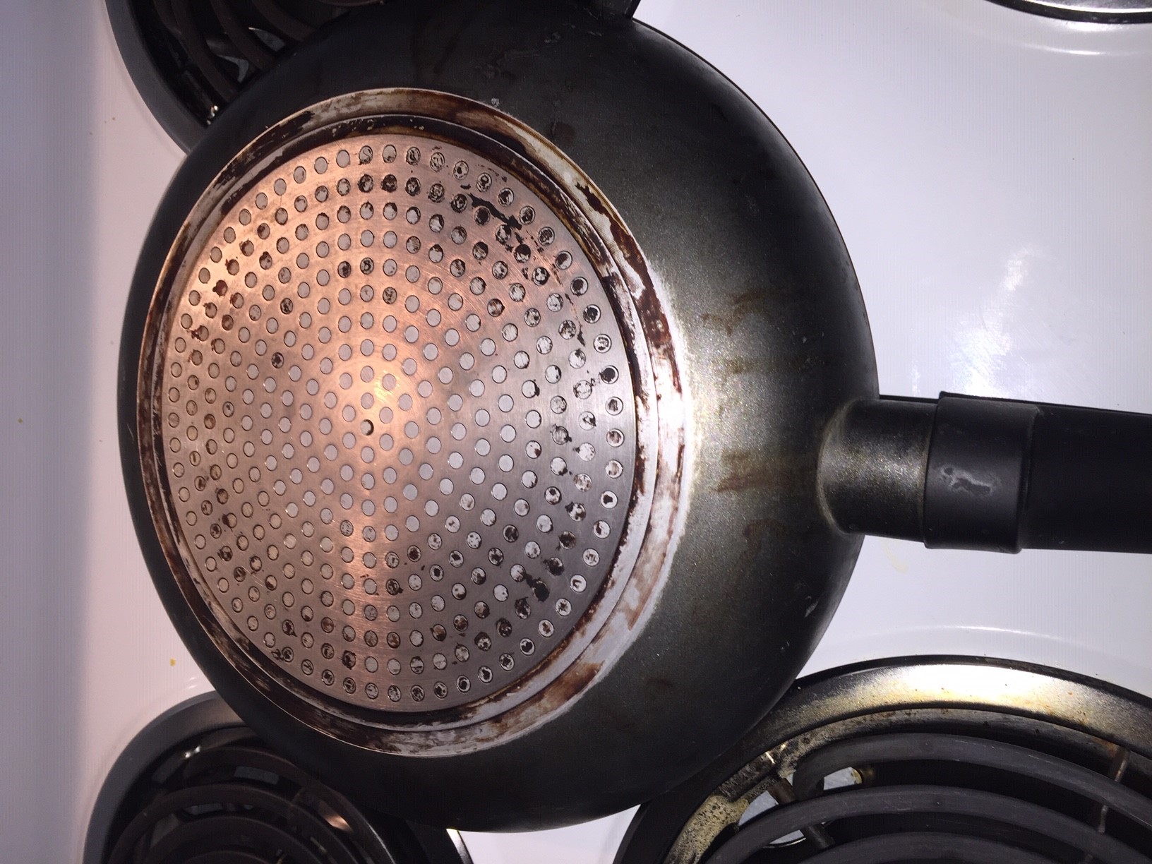 Removing Rust from Cast Iron Pans - The Thrifty Apartment