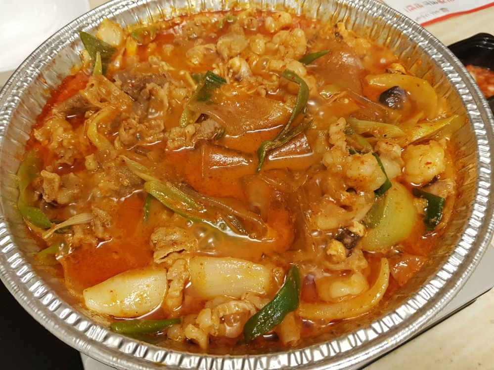 Nak-gop-sae (낙곱새) - Spicy Stew made with Octopus/Squid, Tripe, Shrimp. But we asked for beef instead of the shrimp~