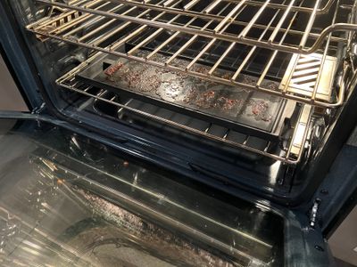 Used bakeware left in greasy oven